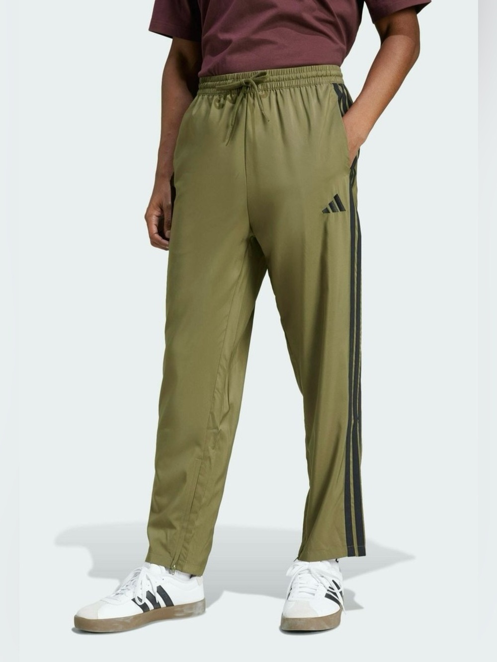 adidas Sportswear Tracksuit bottoms - green with black stripes